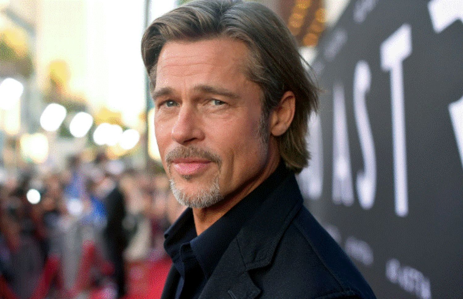 Brad Pitt a dat nas în nas cu familia Angelinei Jolie la o expoziție de artă din Los Angeles. Foto