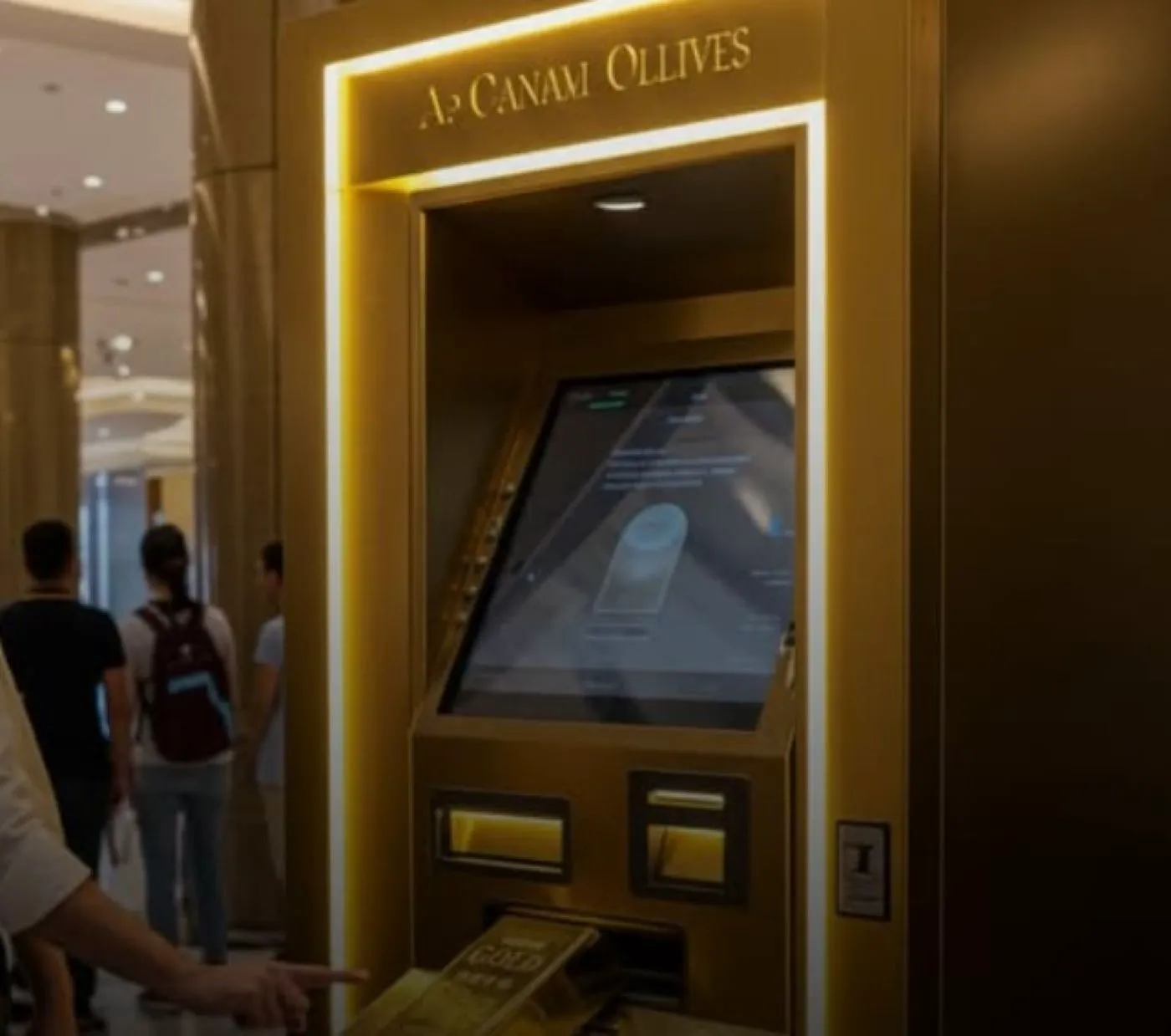 În Dubai, ideea de „bancomat” a fost reinventată și ridicată la rang de spectacol. Aparatul oferă lingouri de aur