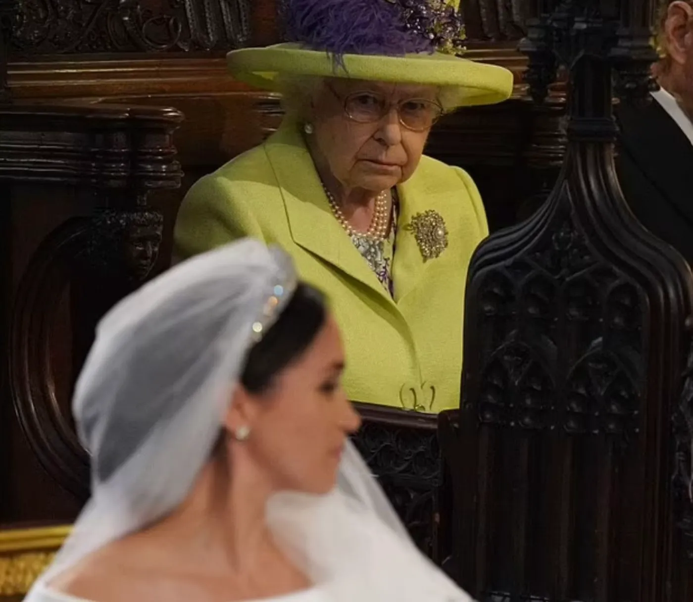 Replica reginei Elisabeta când a văzut rochia de mireasă a lui Meghan Markle. Suverana, cunoscută pentru umorul său sec 