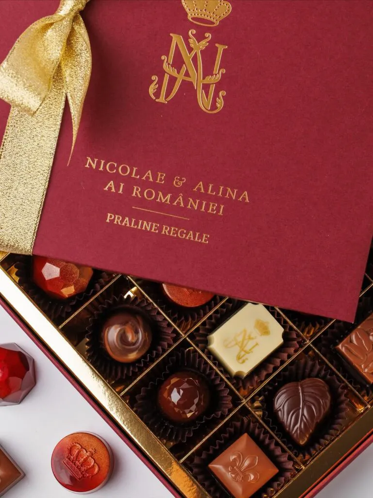 Prințul renegat al României și soția sa o copiază pe Meghan Markle. Lansează afacerea „Pralinele Regale”