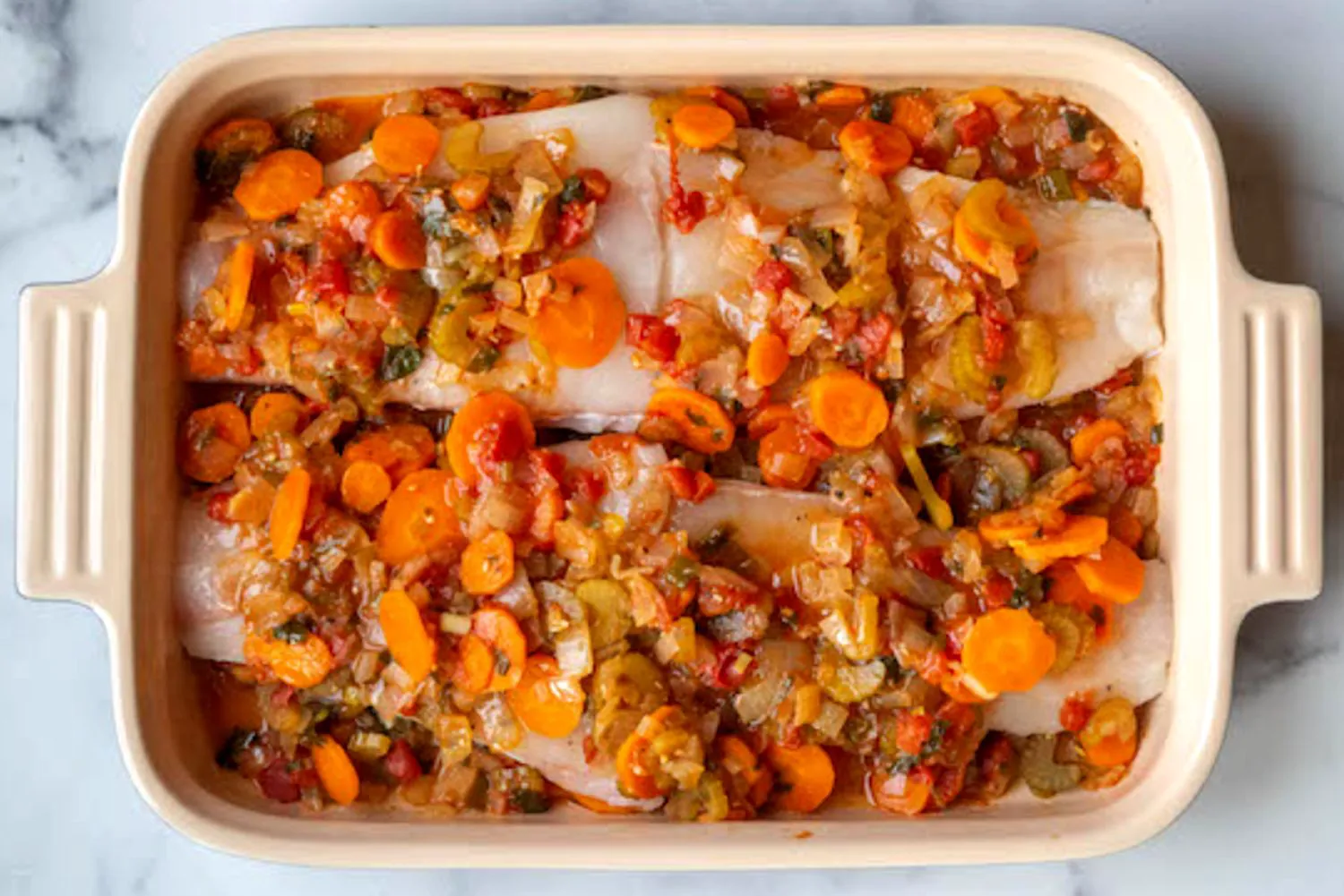 Secretul celui mai bun pește la cuptor în stil grecesc. Rețeta simplă și rafinată pentru sărbătoarea de Florii