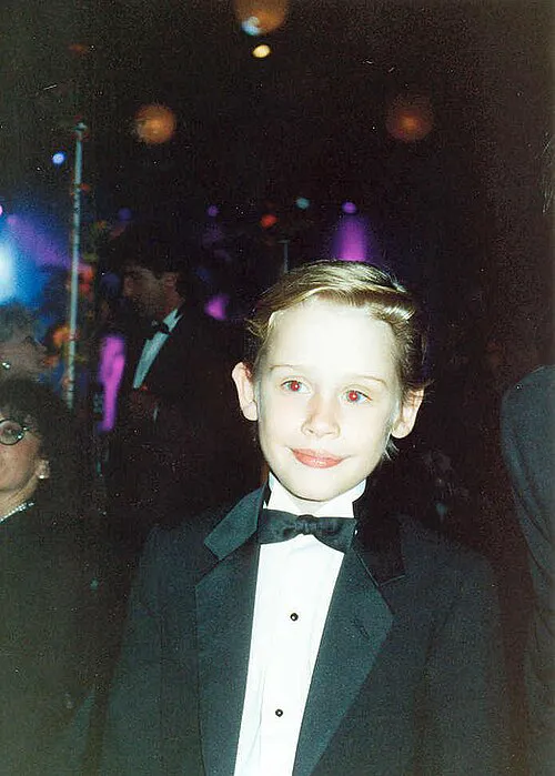 Fostul star copil Macaulay Culkin (fotografiat în 1991) a depus mărturie că a împărțit patul cu Jackson, dar că nu a fost niciodată abuzat. (foto: Wikipedia)