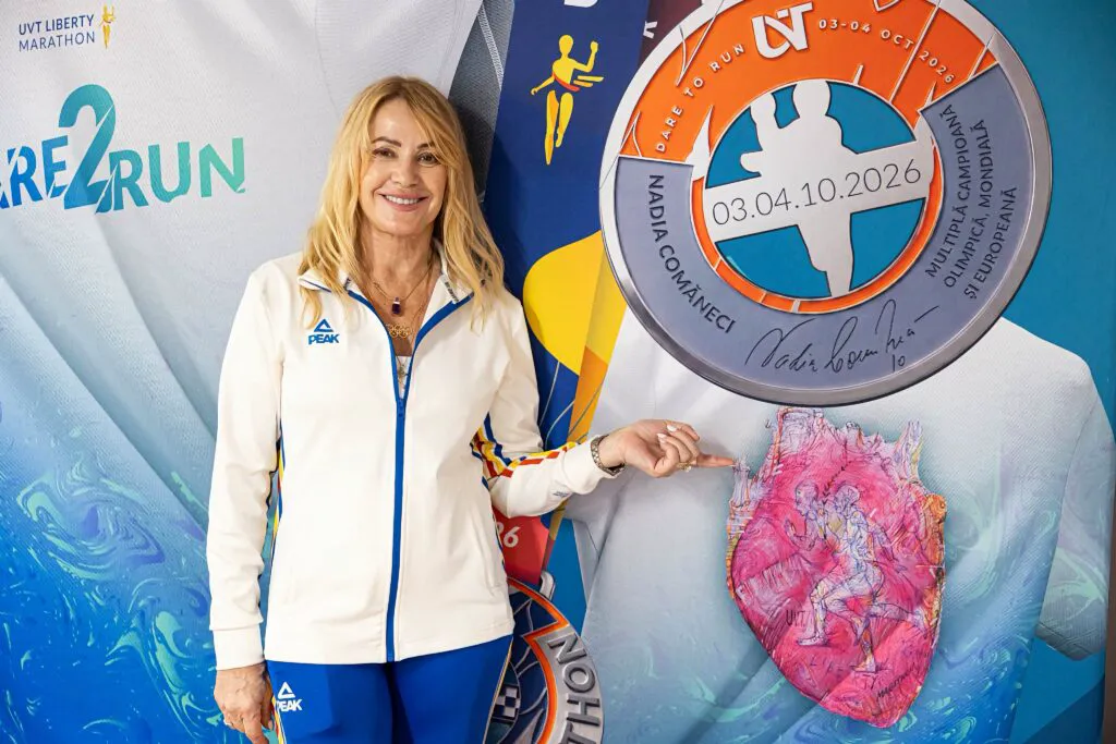 Povestea din spatele tricoului cu inimă primit de Nadia Comăneci. Gimnasta a fost invitată să alerge la maraton 4 Povestea din spatele tricoului cu inimă primit de Nadia Comăneci. Gimnasta a fost invitată să alerge maratonul