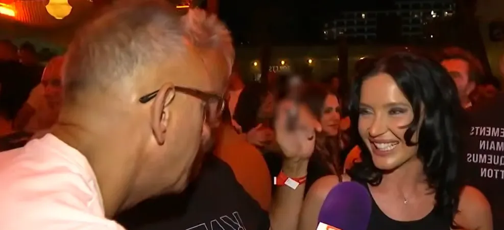 Dan Bittman cu bruneta Andreea in club. Captură Antena Stars